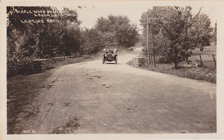 10900-Old car cruising down Maplewood Drive