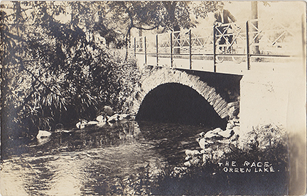 10612-The Bridge over the mill race. This bridge in Playground Park has been replaced by a modern white bridge. This bridge is adjacent to where the dentist office is now.