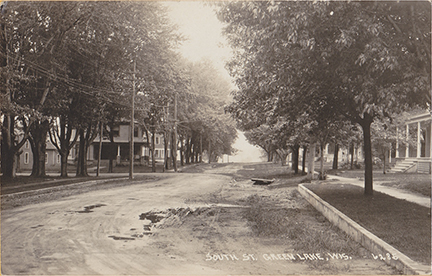 10965-South Street Looking West. Looking West along South Street. Lawson Drive goes off to the left and the house there is the current McConnell Inn.