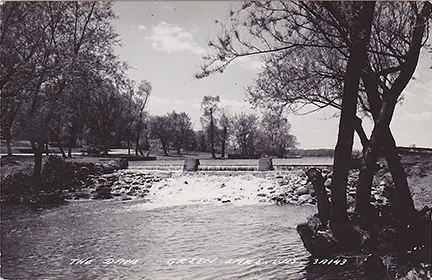 11037-The dam at Mill Pond, Playground Park-This is a view of the dam when the mill pond was being used as the State Fish Pond - The buildings in the background are the Fish Rearing Facilities. 