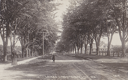 11125-Lovers Lane, Lake Street. This is looking North up Lake Street. Oakwood would be to the left and the drive to the Greenway's house is to the right. - Postmarked 1921