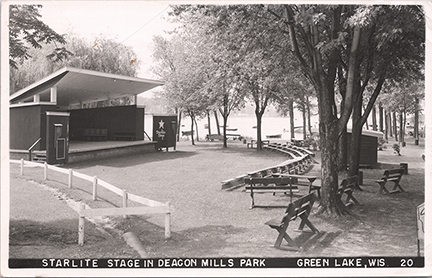 11254-Starlight Stage in Deacon Mills Park, South Street. Harriet (Hattie) Mills donated this valuable piece of lakefront in honor of her father, James C. Mills aka Deacon Mills. Robert Malcolm led many concerts on this stage with the Green Lake Bands he formed. - Postmarked 1956