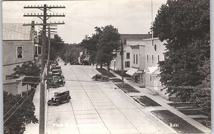 11284-Mill Street Looking North. Looking North up Mill Street from South Street.  By the time this photo was taken the Opera House has replaced Thrasher's Hall. - Postmarked 1942