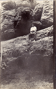 11071-Little boy sitting on rock at Mitchell's Glen