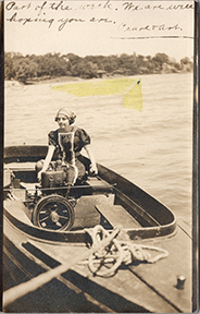 11324-Photo postcard of lady in motor launch-Dated 1911