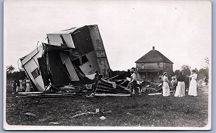 11160-Storm Damage, June 24, 1914, Overturned houses, People standing around