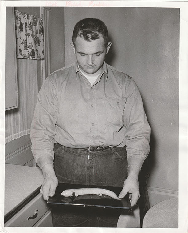 Eugene Mirr captures an Albino Mudpuppy in Green Lake in 1957